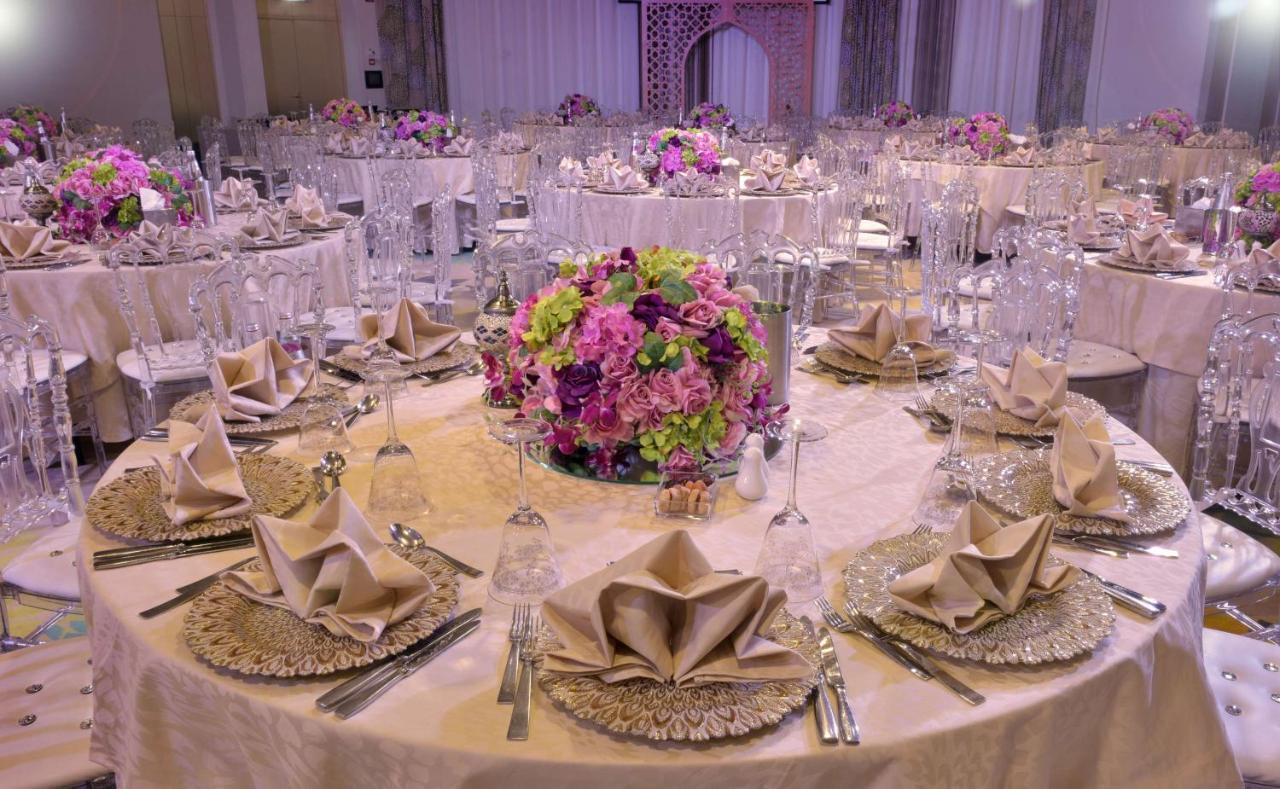 Symphony Style Hotel Kuwait Salmiya Exterior foto A table set for a formal dinner